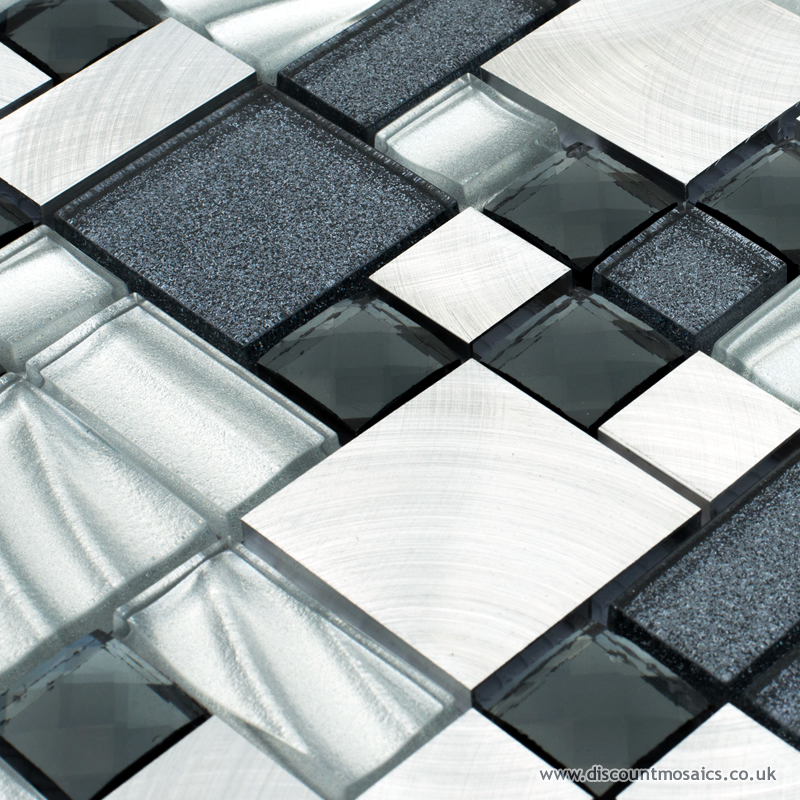 Fusion silver modular mosaic tiles with a mix of glass and metal mosaics. Glitter black mosaic and metallic silver included.